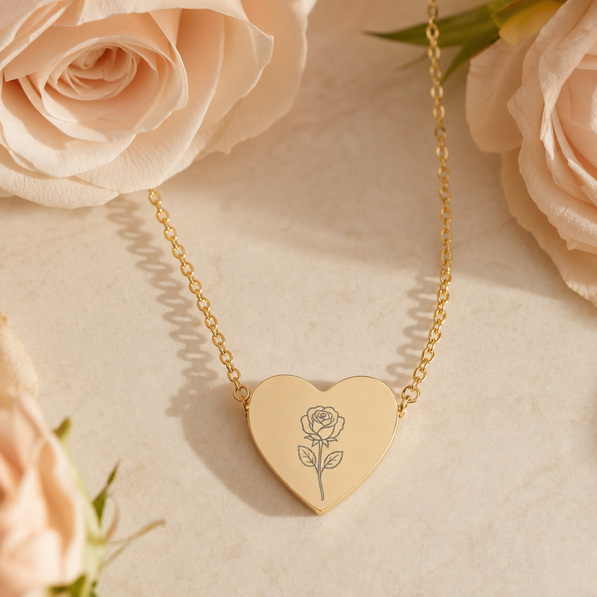 June birth flower necklace — rose heart pendant hero with rose blooms