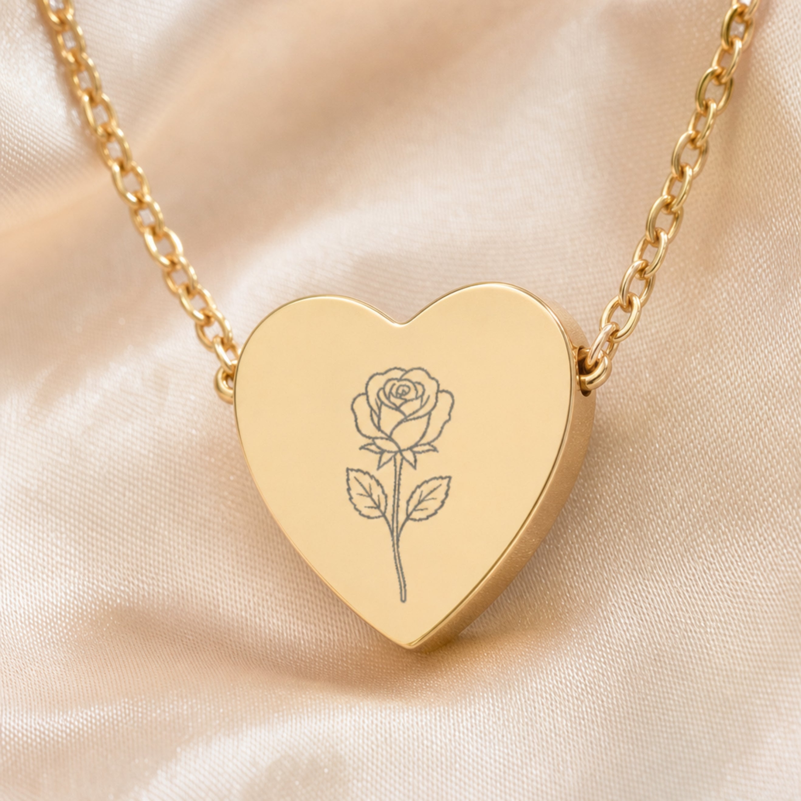 June rose engraving close-up — laser-etched detail on heart pendant in 18K Gold PVD