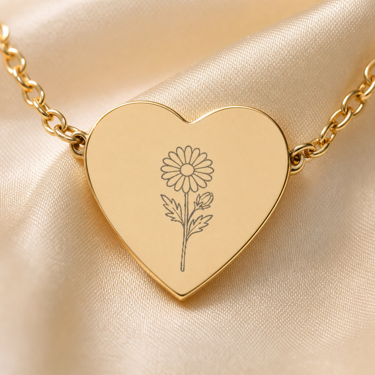 September aster engraving close-up — laser-etched detail on heart pendant in 18K Gold PVD