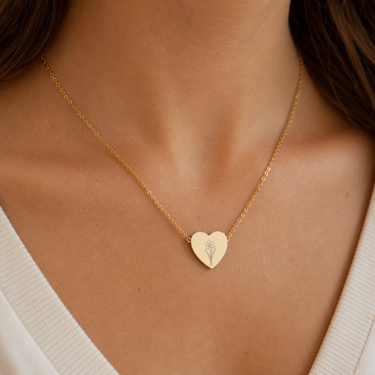 December birth flower necklace with narcissus engraving in 18K Gold PVD, worn on model