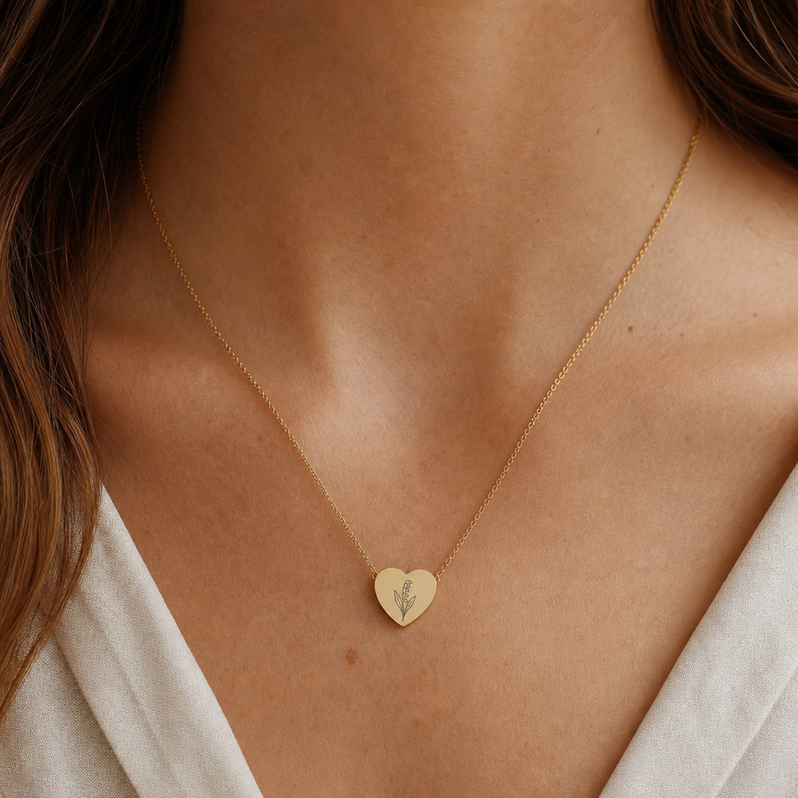 May birth flower necklace with lily of the valley engraving in 18K Gold PVD, worn on model