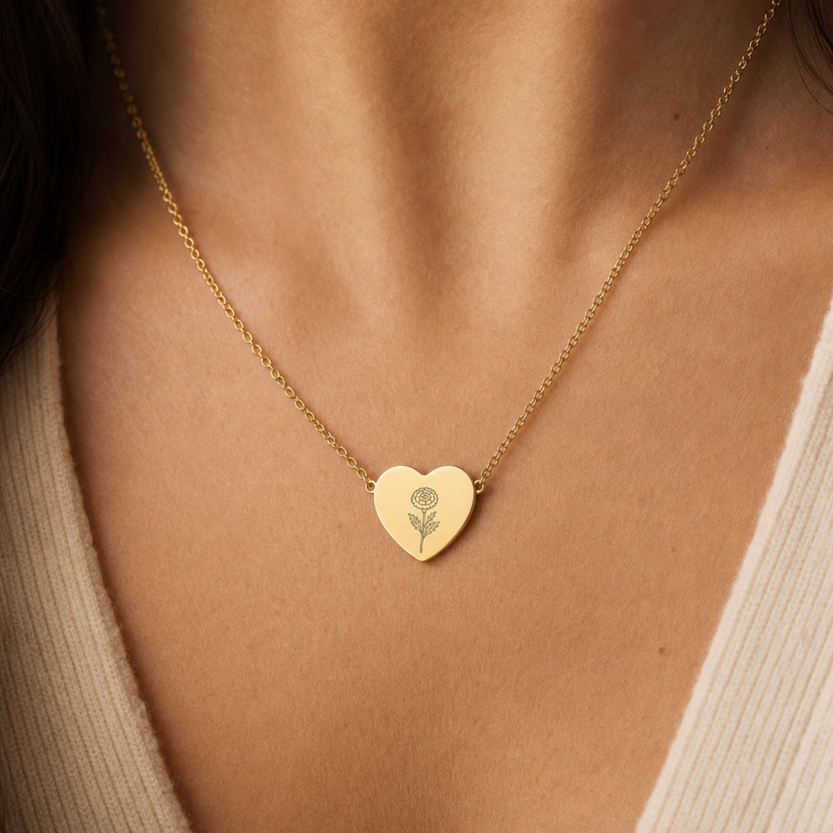 October birth flower necklace with marigold engraving in 18K Gold PVD, worn on model
