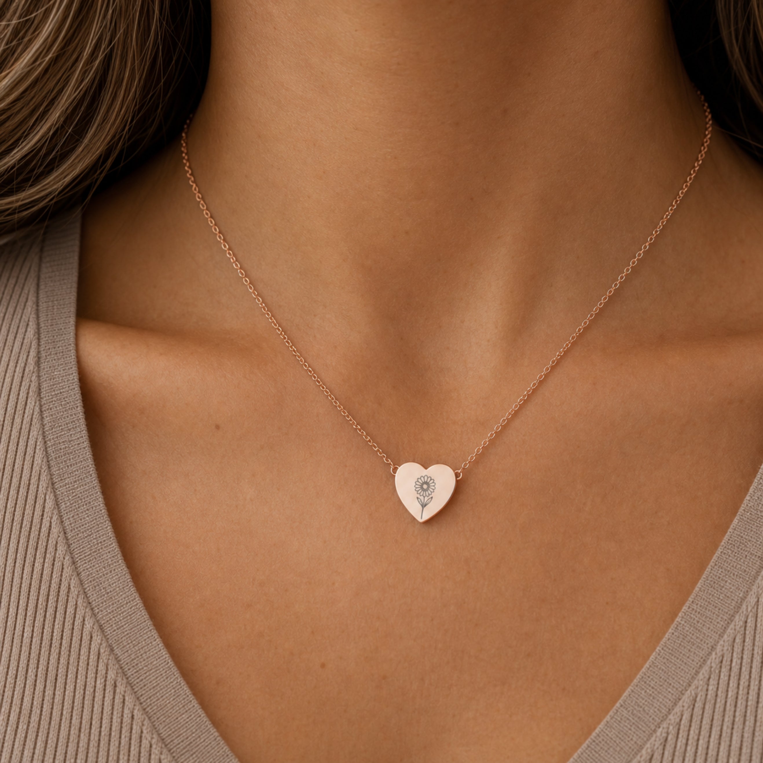 April birth flower necklace with daisy engraving in 18K Rose Gold PVD, worn on model