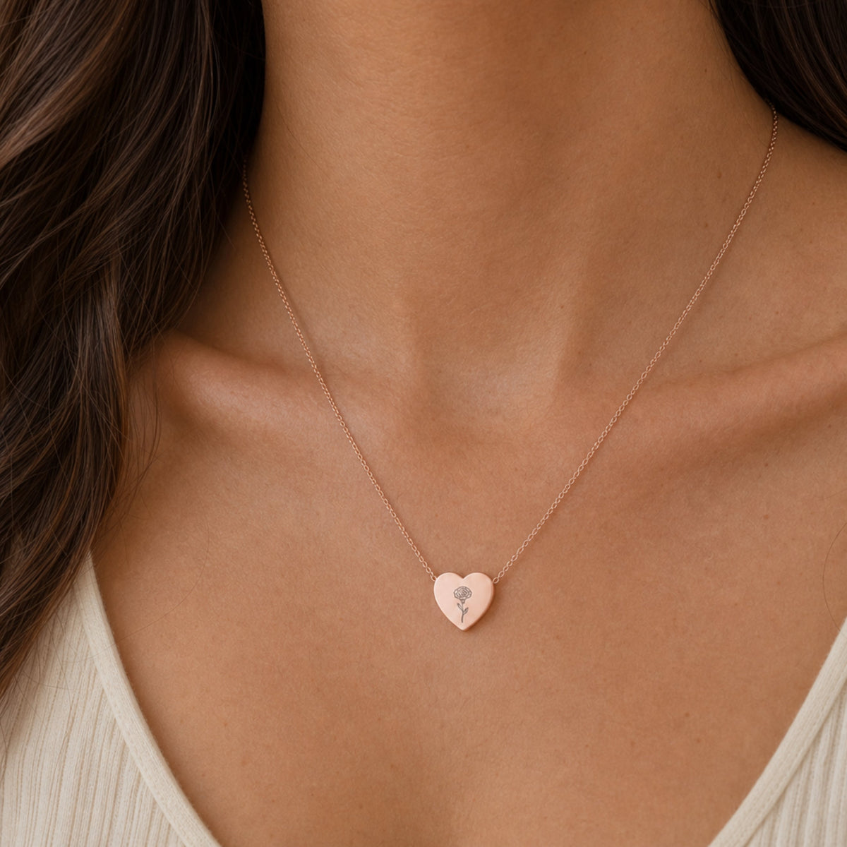 January birth flower necklace with carnation engraving in 18K Rose Gold PVD, worn on model