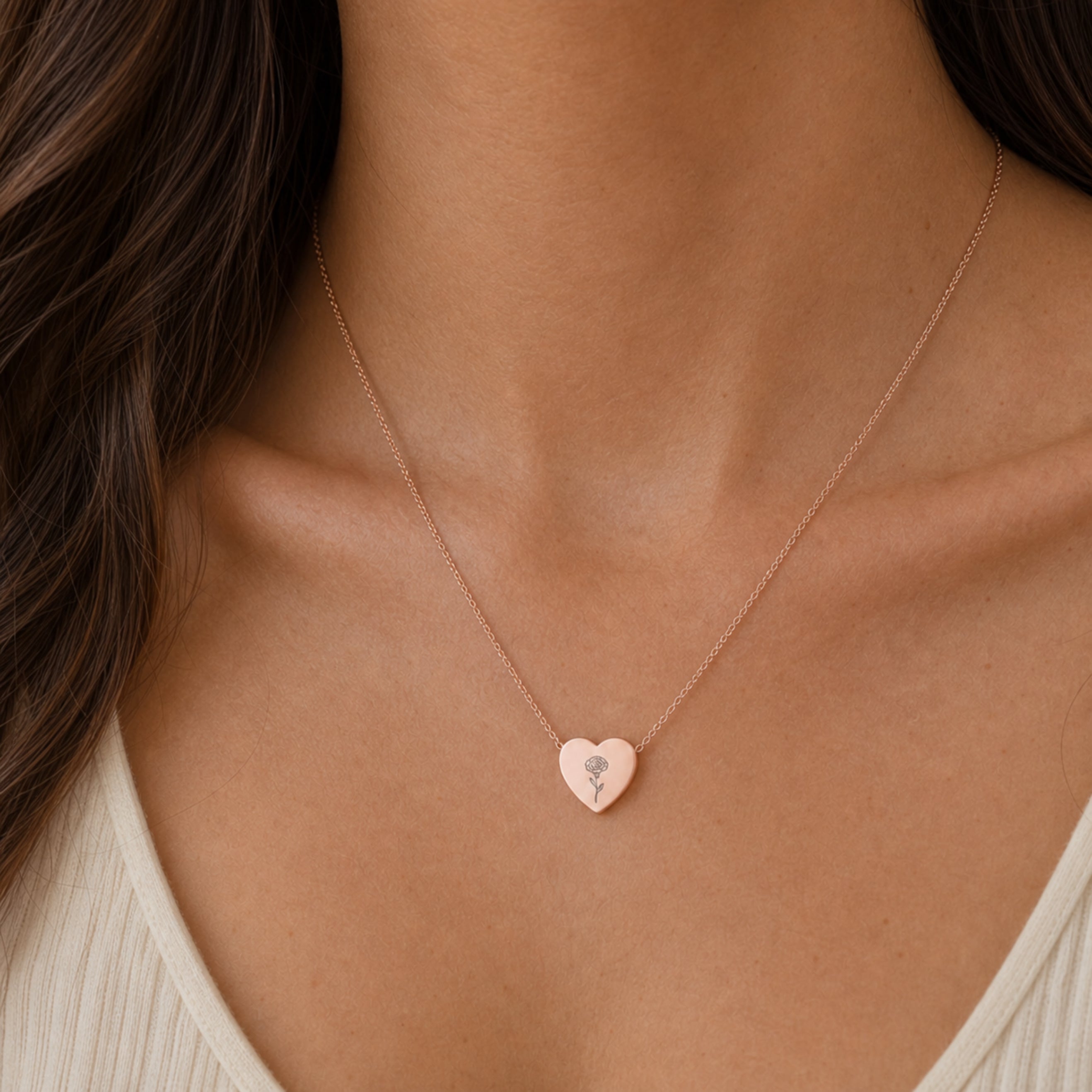 January birth flower necklace with carnation engraving in 18K Rose Gold PVD, worn on model