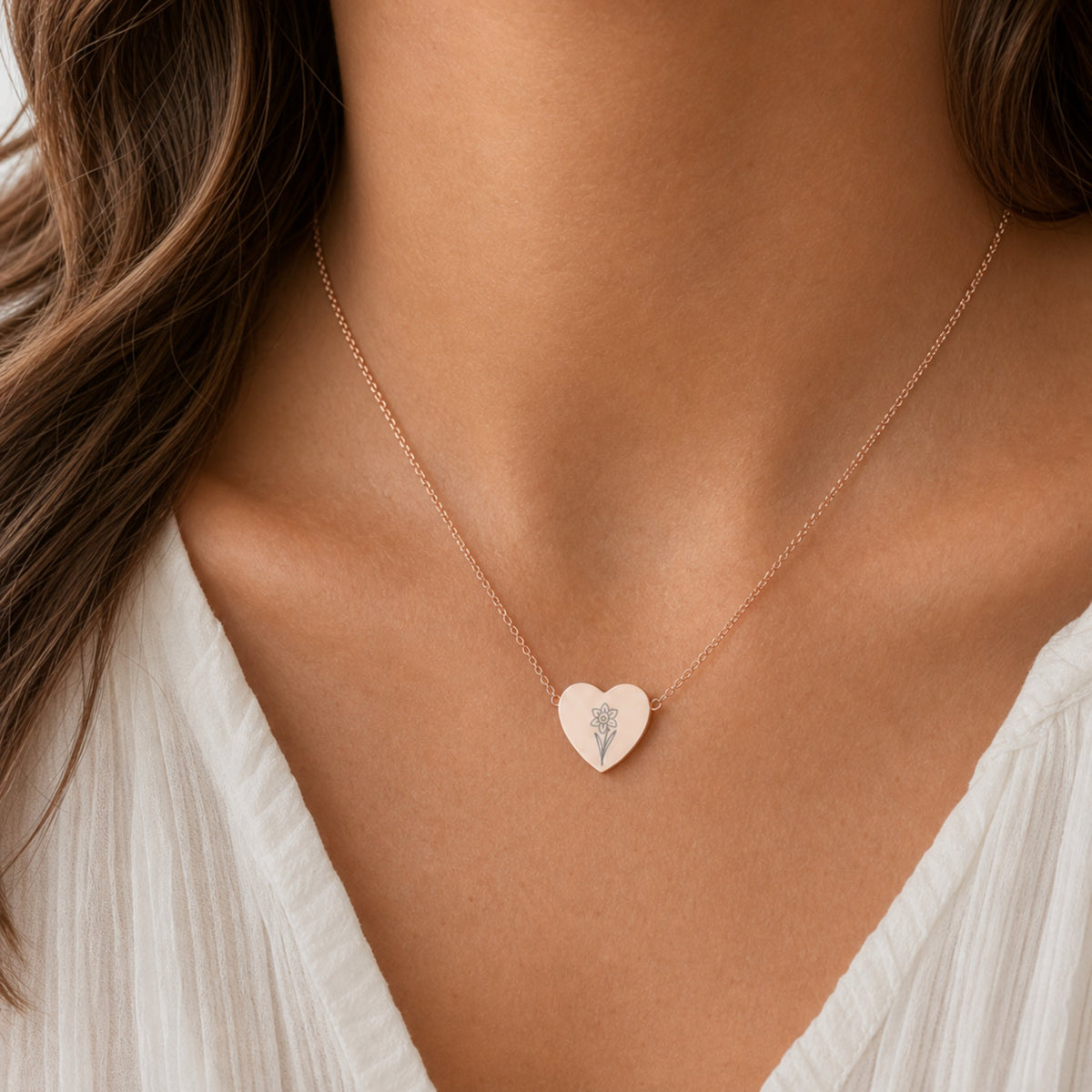 March birth flower necklace with daffodil engraving in 18K Rose Gold PVD, worn on model