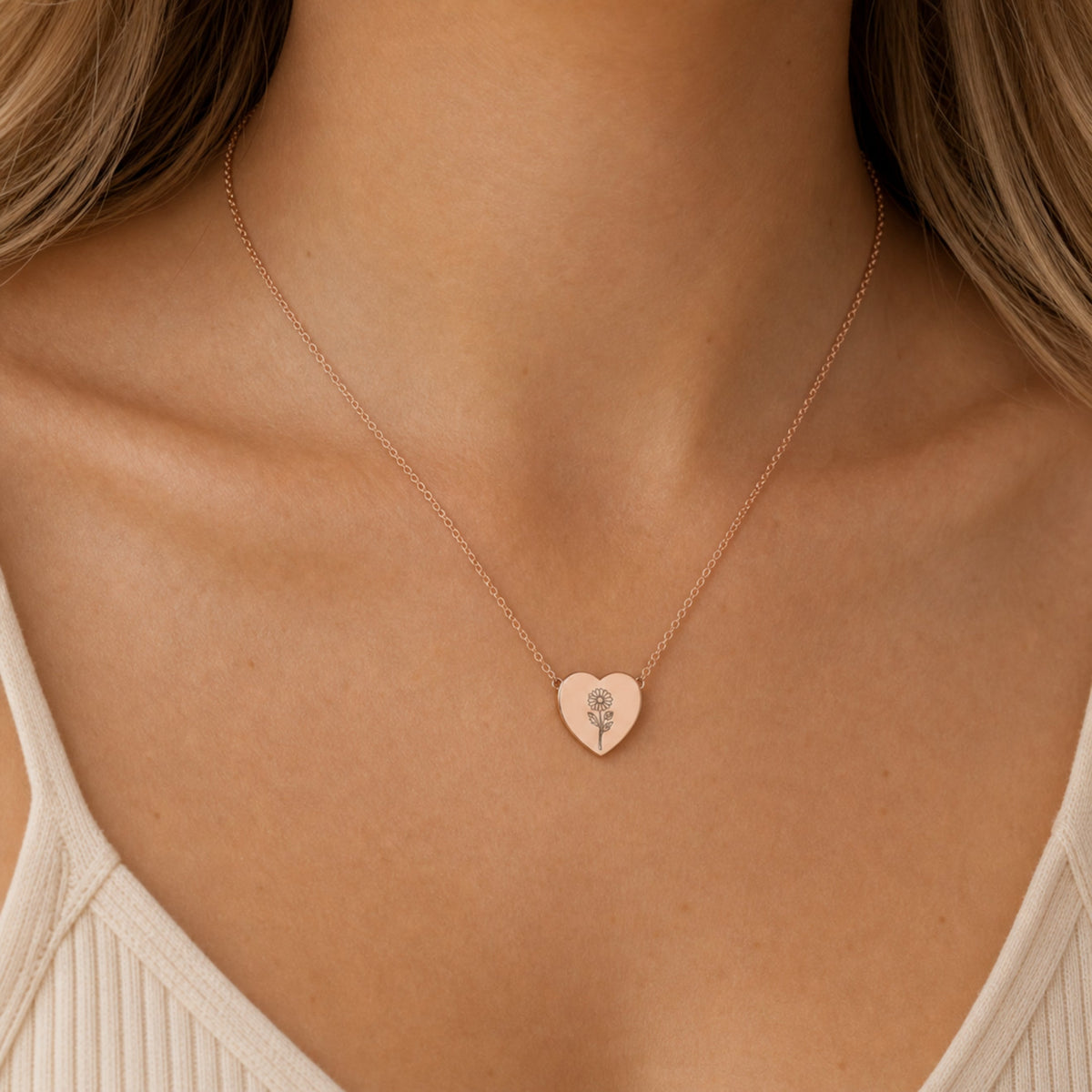 September birth flower necklace with aster engraving in 18K Rose Gold PVD, worn on model