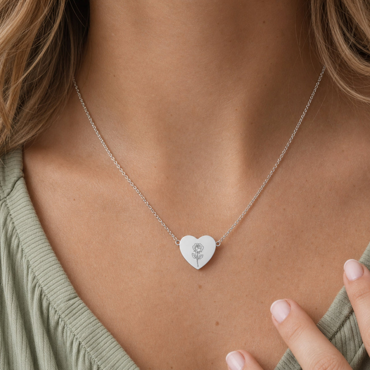 June birth flower necklace with rose engraving in polished 316L stainless steel, worn on model