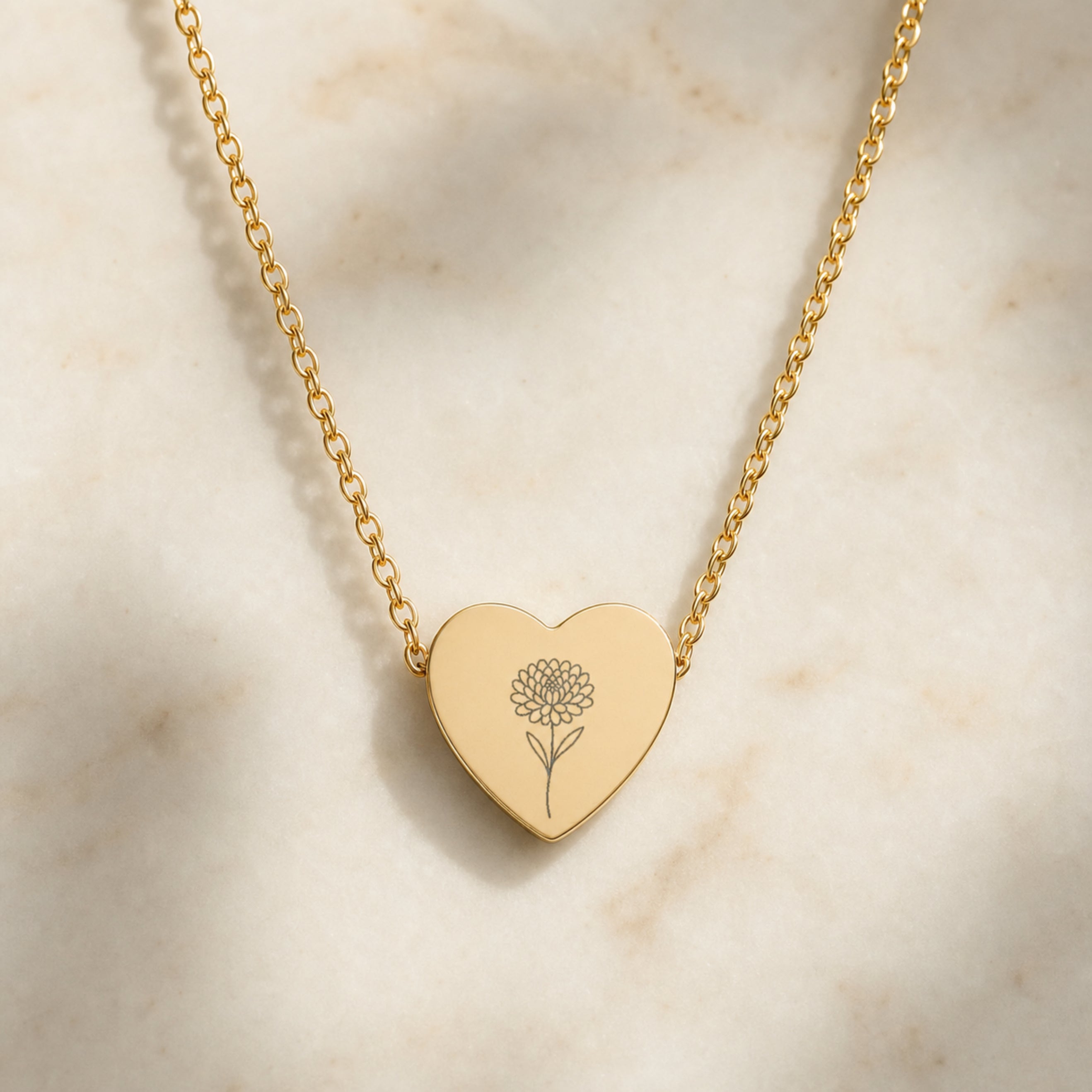 November birth flower necklace with chrysanthemum engraving on linen flatlay with full chain
