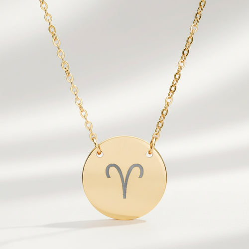 Aries zodiac coin necklace close-up — laser-engraved Aries star sign on 18K gold pendant