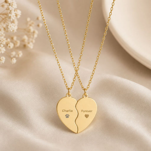 Memory That Lasts Break Apart pet memorial necklace, gold finish, two-piece heart closeup with engraved name and paw print