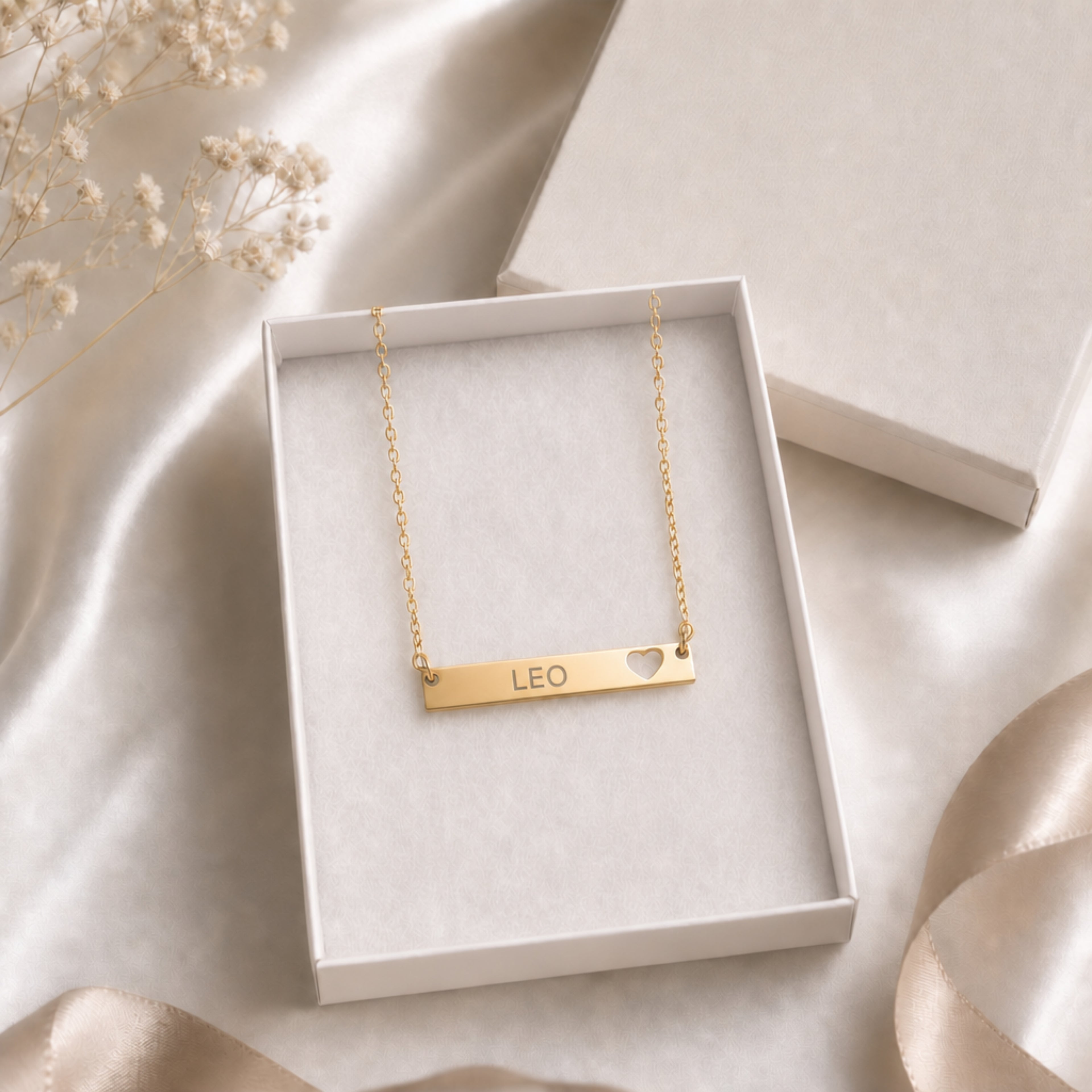 Leo zodiac necklace — cutout heart bar pendant in cream gift-ready box, premium editorial unboxing