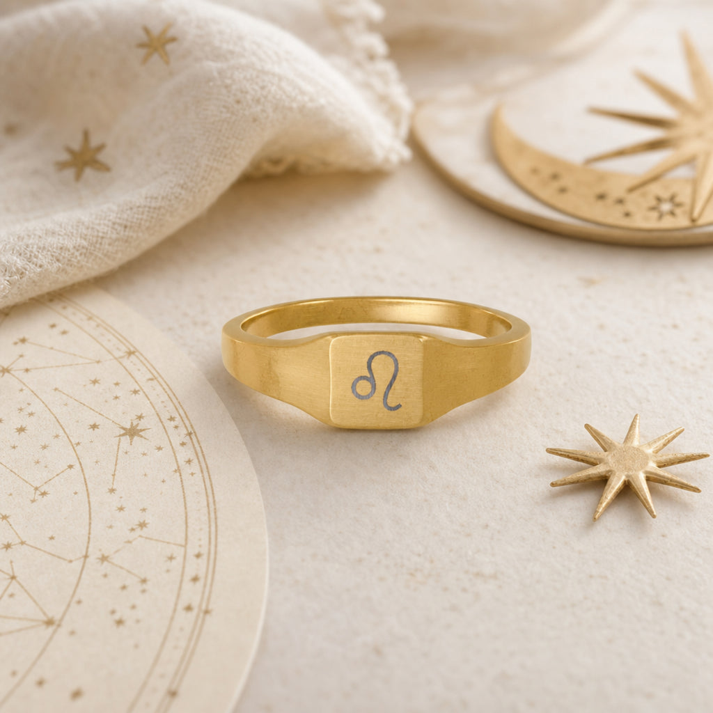 Leo zodiac square signet ring celestial flatlay — zodiac chart and brass star with engraved Leo signet, astrology gift styling