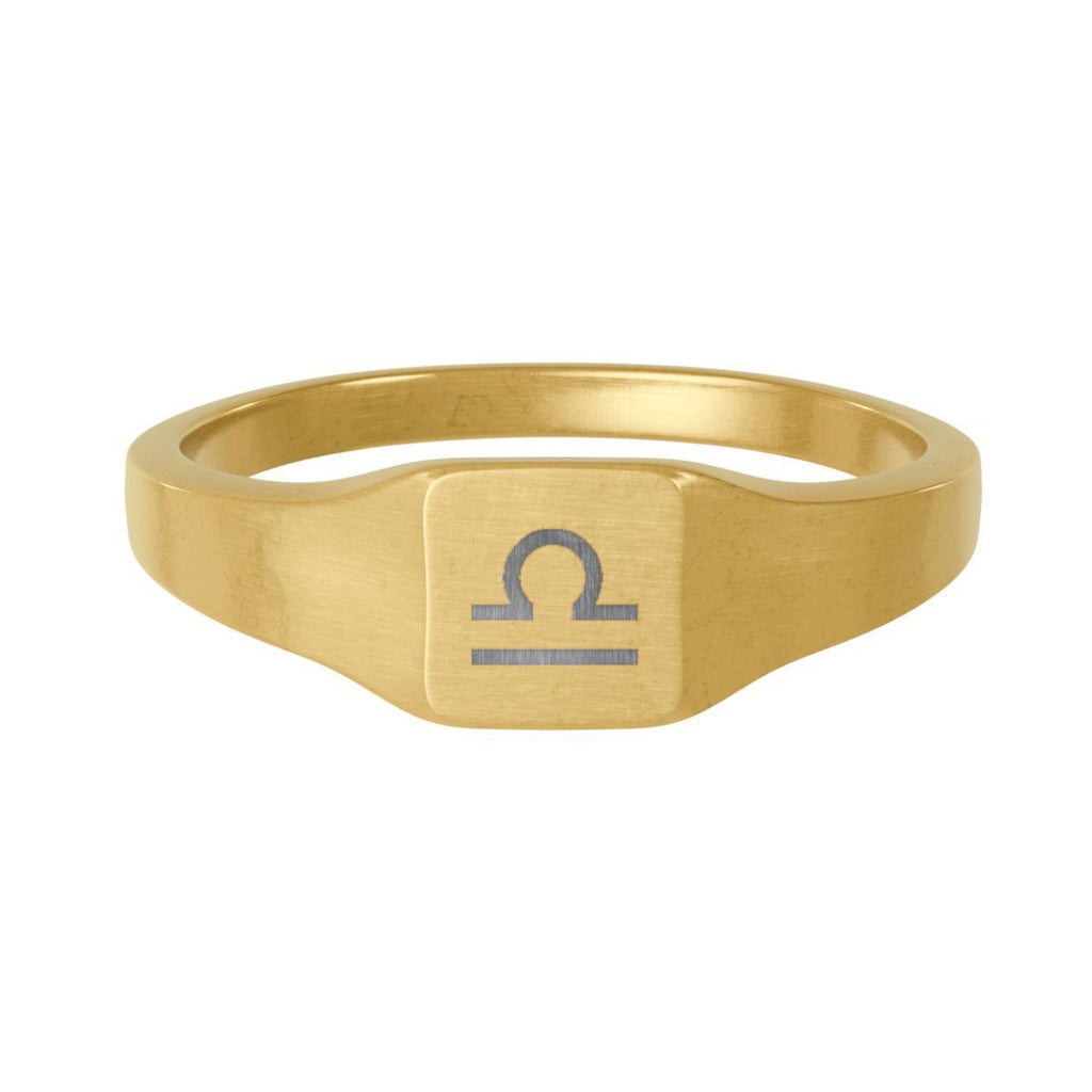 Libra zodiac square signet ring — hero macro of laser-engraved Scales on 18K gold square face, premium personalized astrology ring gift