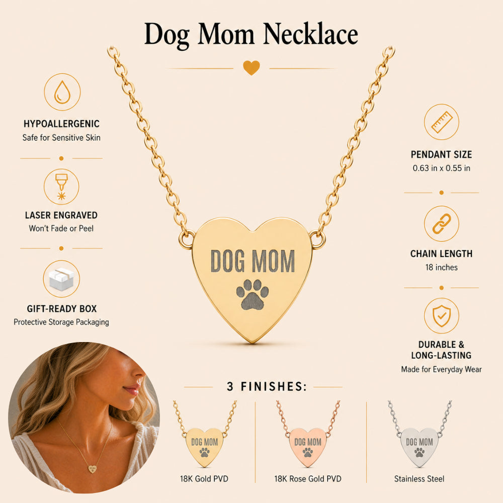 Dog Mom engraved heart pendant detail — paw print and lettering on a polished finish
