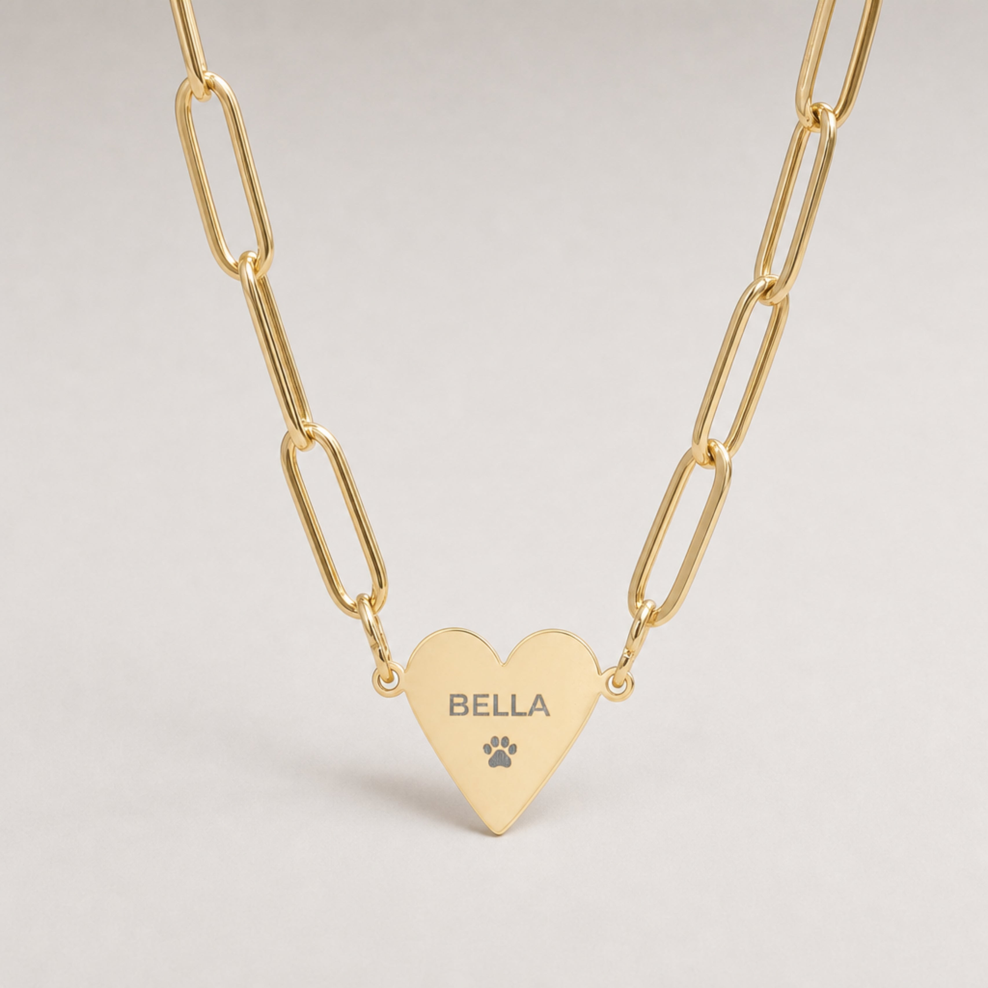 Memory That Lasts personalized paperclip heart necklace, gold finish, closeup macro with engraved name and paw print