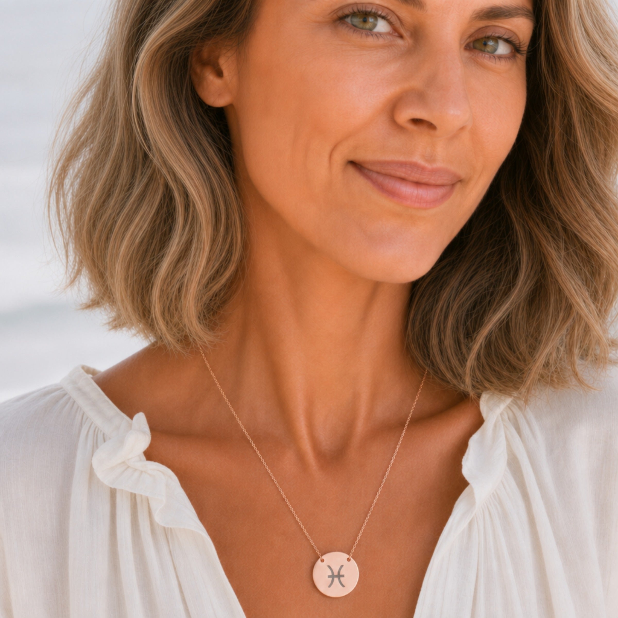 Pisces zodiac coin necklace in 18K rose gold worn on model — engraved Pisces Fish pendant, rose gold layering necklace, personalized birthday gift for Pisces