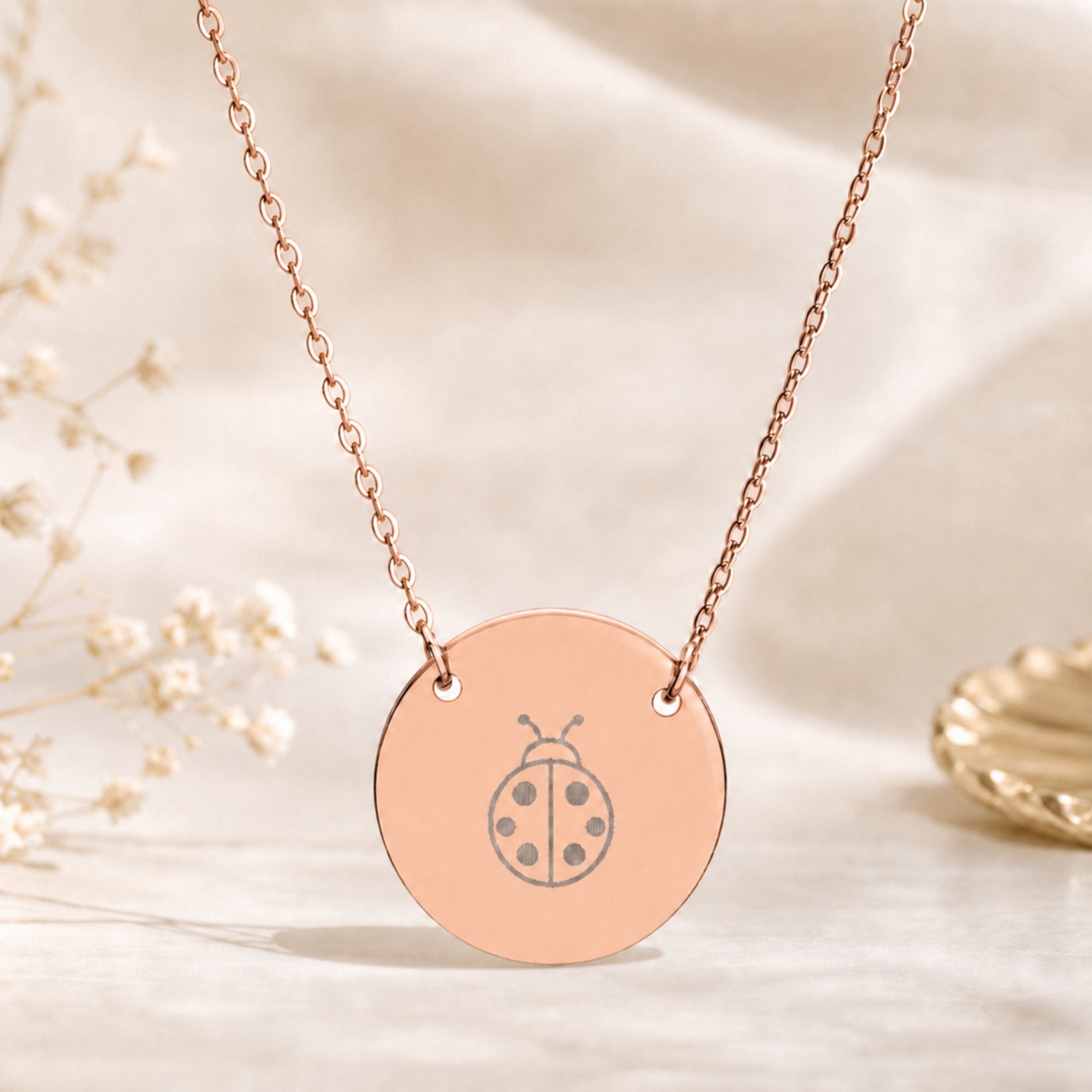 Memory That Lasts ladybug coin necklace, Rose Gold finish, closeup macro