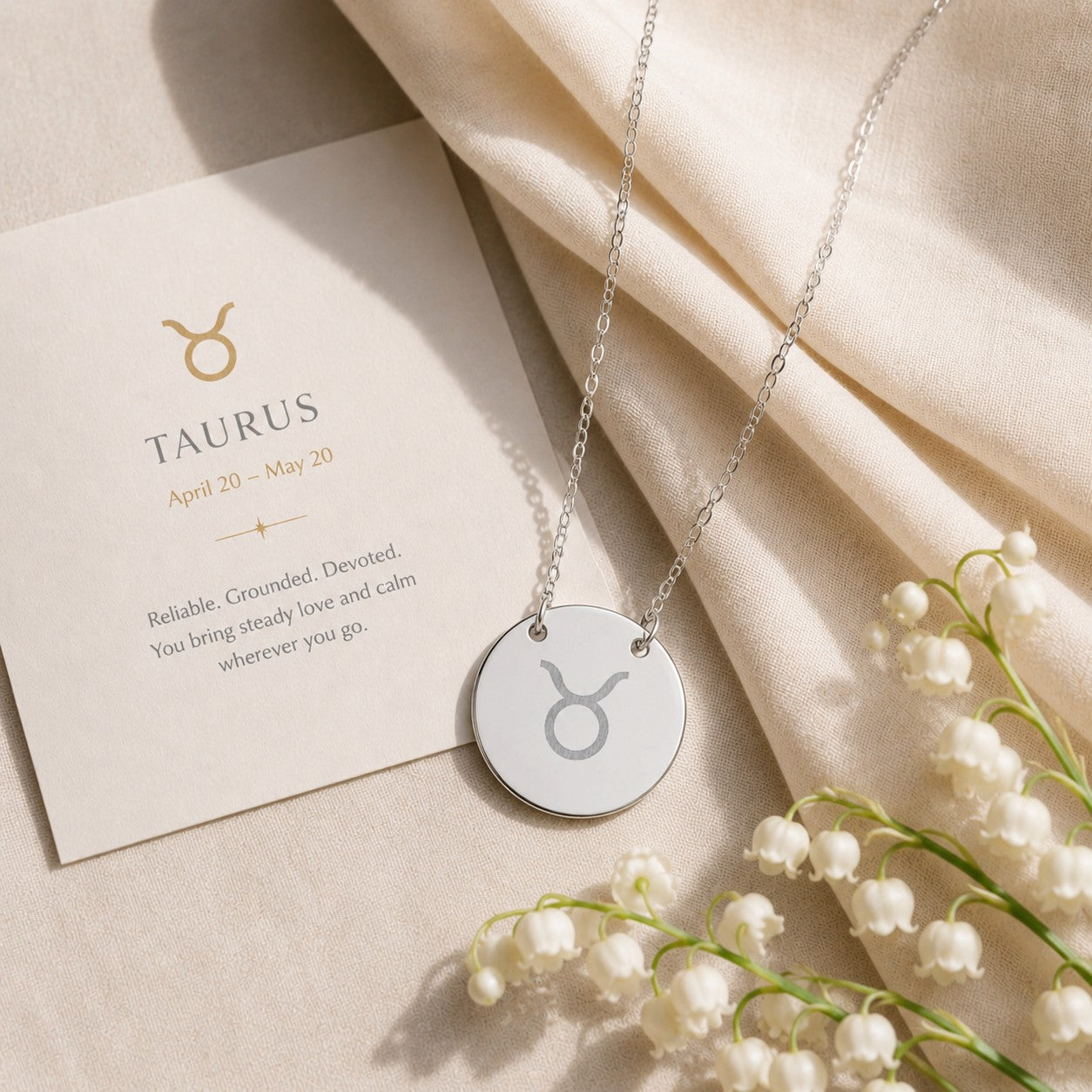 Taurus zodiac coin necklace — engraved star sign pendant. Memory That Lasts.