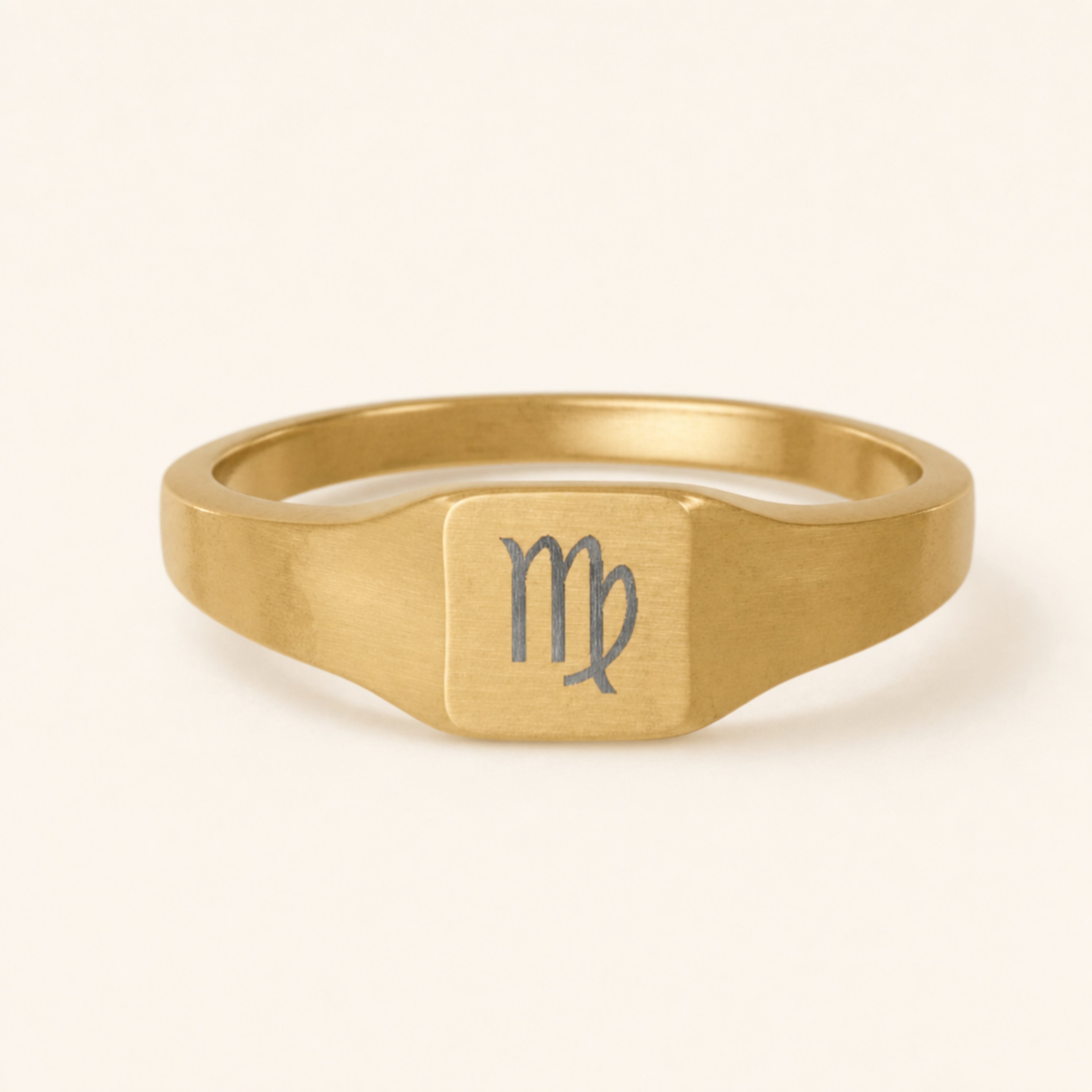 Virgo zodiac square signet ring — hero macro of laser-engraved Maiden on 18K gold square face, premium personalized astrology ring gift