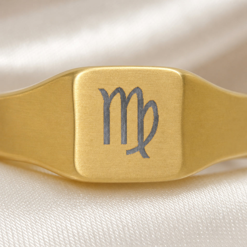 Virgo zodiac square signet ring engraving close-up — laser-etched Maiden detail, brushed grey on matte gold